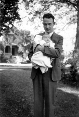 My great-uncle Ray Rhodes, holding Ann Rhodes at 11 weeks old, 10/31/1937