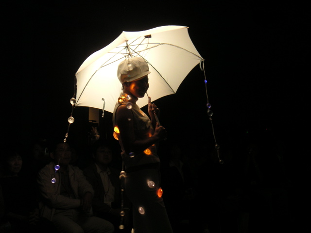 My favorite shot (unfortunately the umbrella glow is from a spotlight, not self-illuminated)